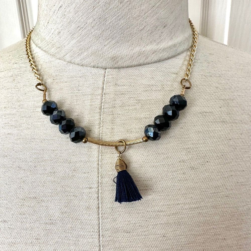 Gold tone blue beaded tassel necklace